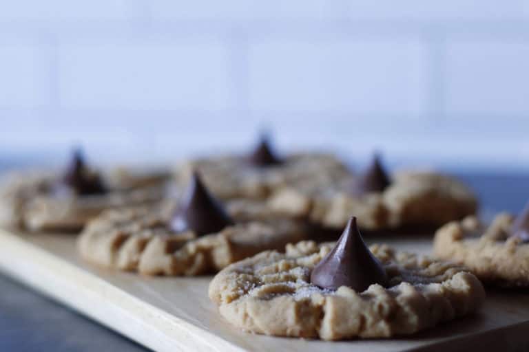 Buttery cookies topped with melted chocolate chips, freshly baked and perfect for dessert or snack time. deliciously soft and sweet, ideal for homemade treats and cookie lovers.