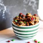 pretzels with chocolate and M&M toppings in a bowl