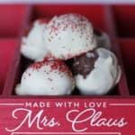 Frosted cookies in a red box with "Mrs. Claus Cookie Company" branding, featuring white icing and red sprinkles, showcasing festive holiday treats.