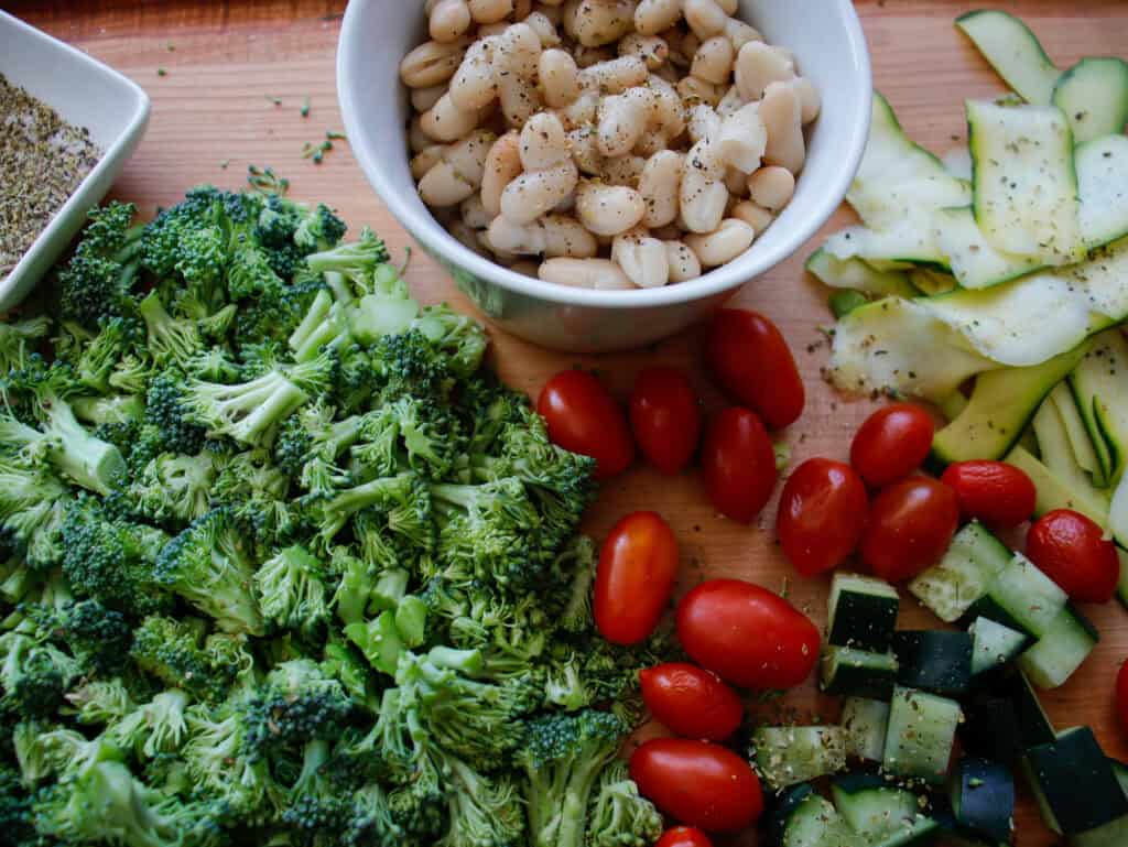 salad ingredients on a wood cutting board
