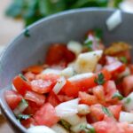 Gray bowl of pico de gallo