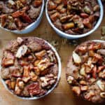Four pumpkin apple spice bakes in ramekin dishes.