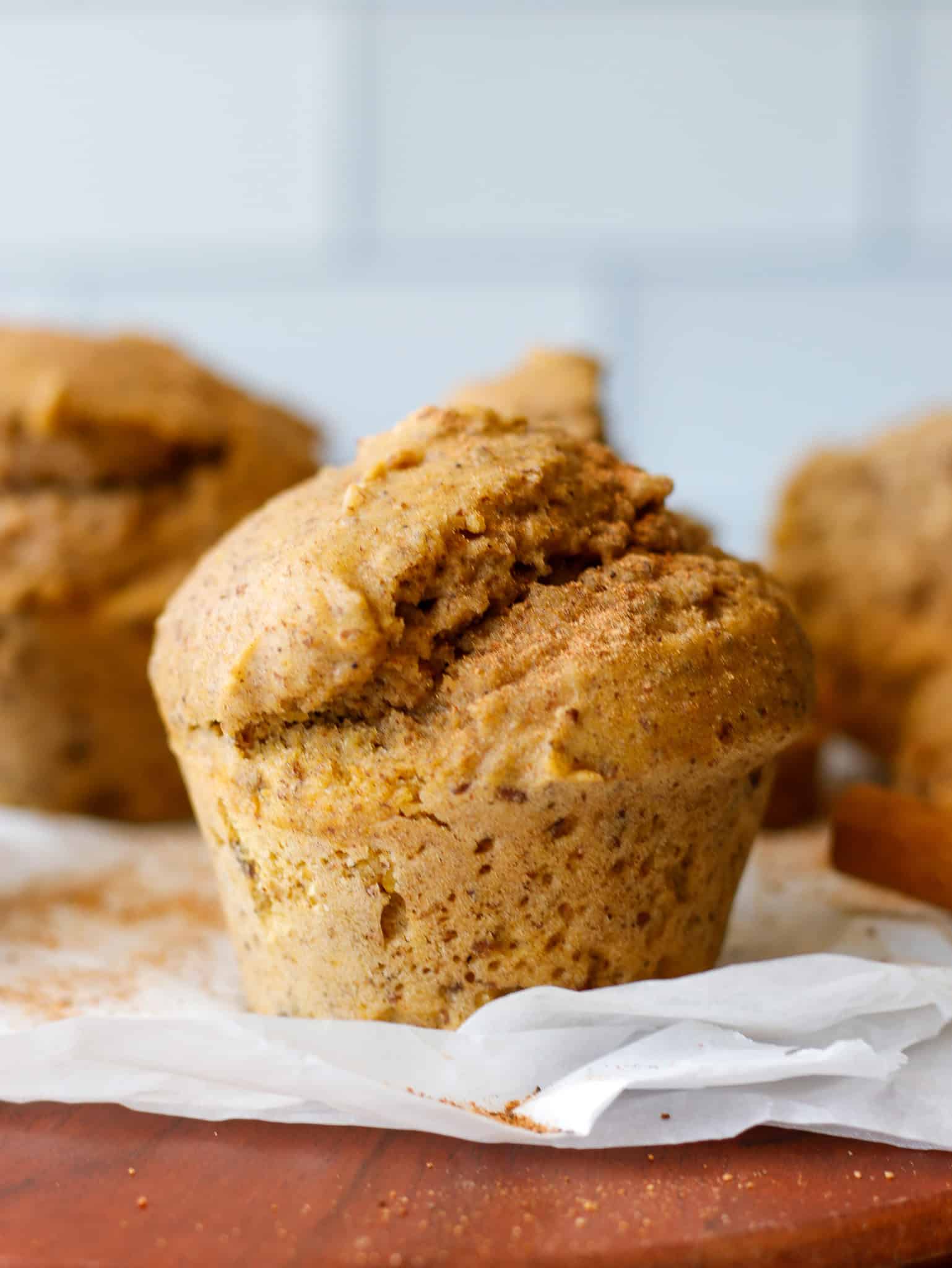 Pumpkin flax seed muffin on a white napkin