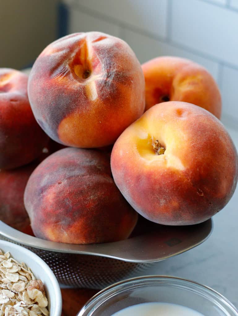 Large peaches in a bowl