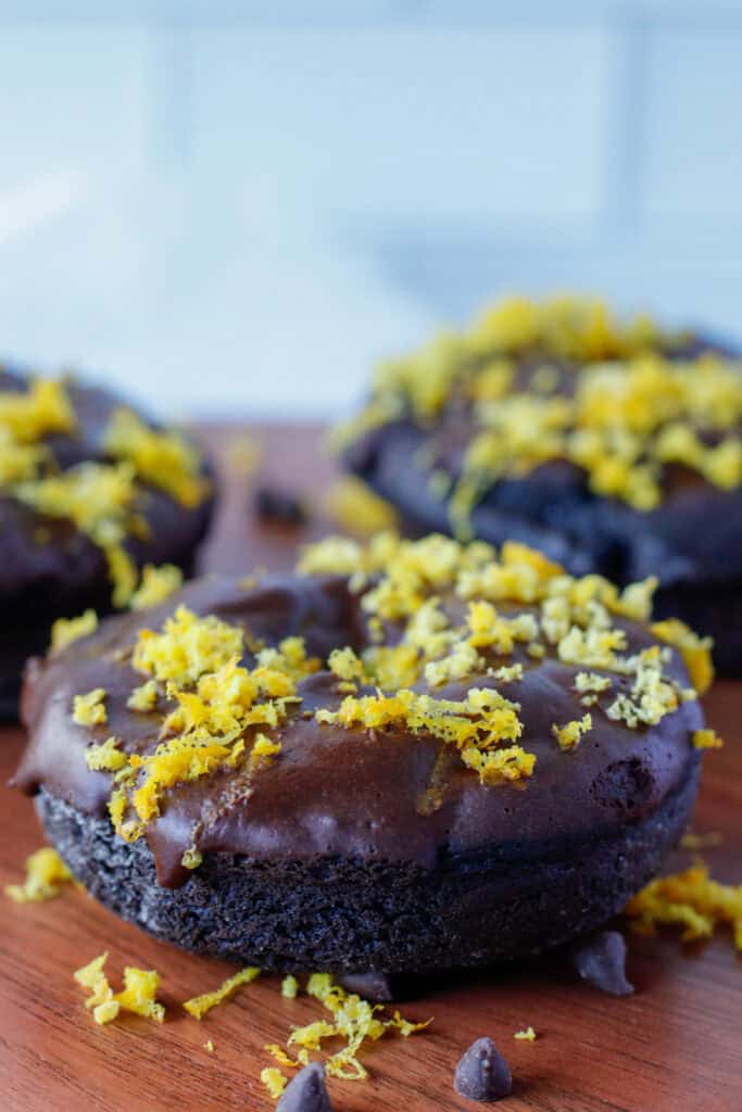 Chocolate donuts on a plate.