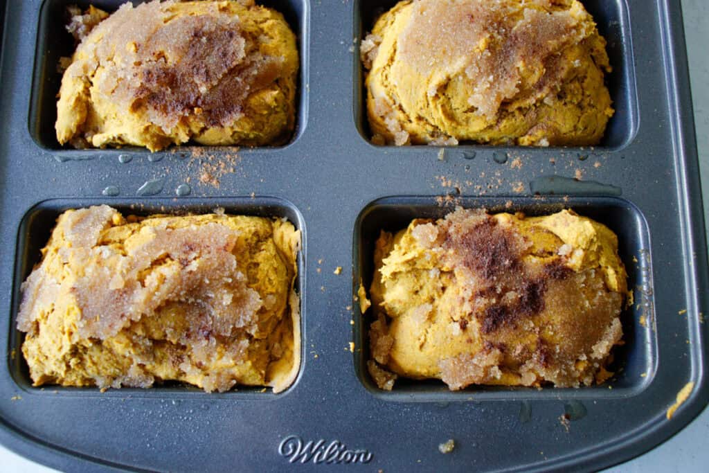 Close up of pumpkin spice bread in mini loaf pan