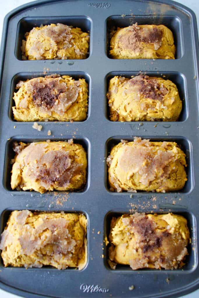 Overhead shot of pumpkin spice bread in a mini loaf pan