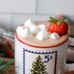 Christmas mug with hot cooca protein dip topping with marshmallows