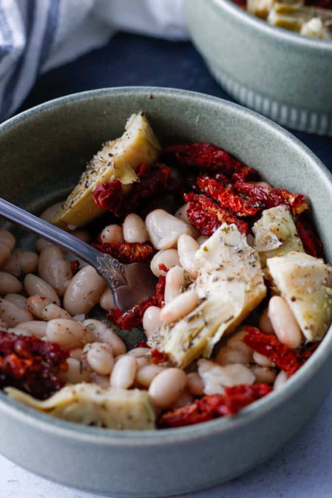 Mediterranean White Bean Skillet freshly prepared. An easy one-pot vegetarian meal perfect for lunch or dinner.