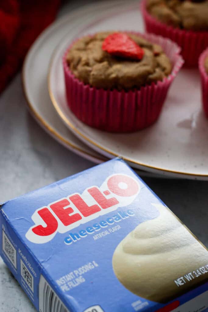 cheesecake jell-o mix an ingredient for strawberry cheesecake muffins on plates in the background