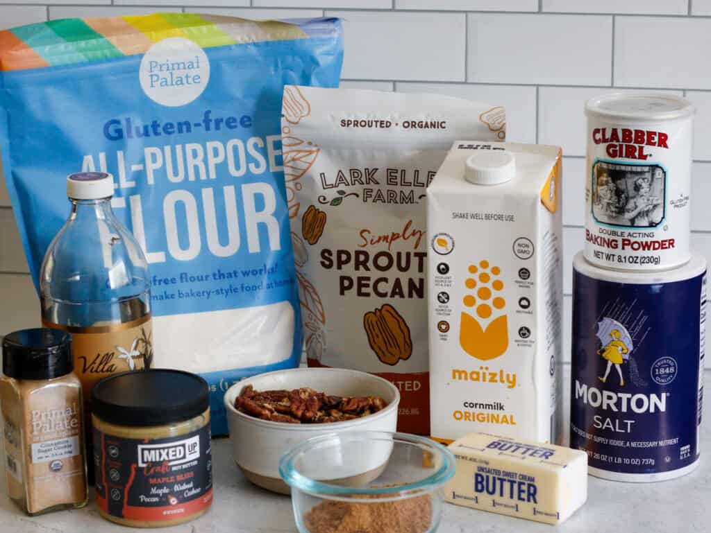 Bag of gluten-free all-purpose flour, almond flour, pecans, pecan pieces, coconut milk, baking powder, salted butter, cinnamon sugar, salt, and pecan in a bowl for baking or cooking.