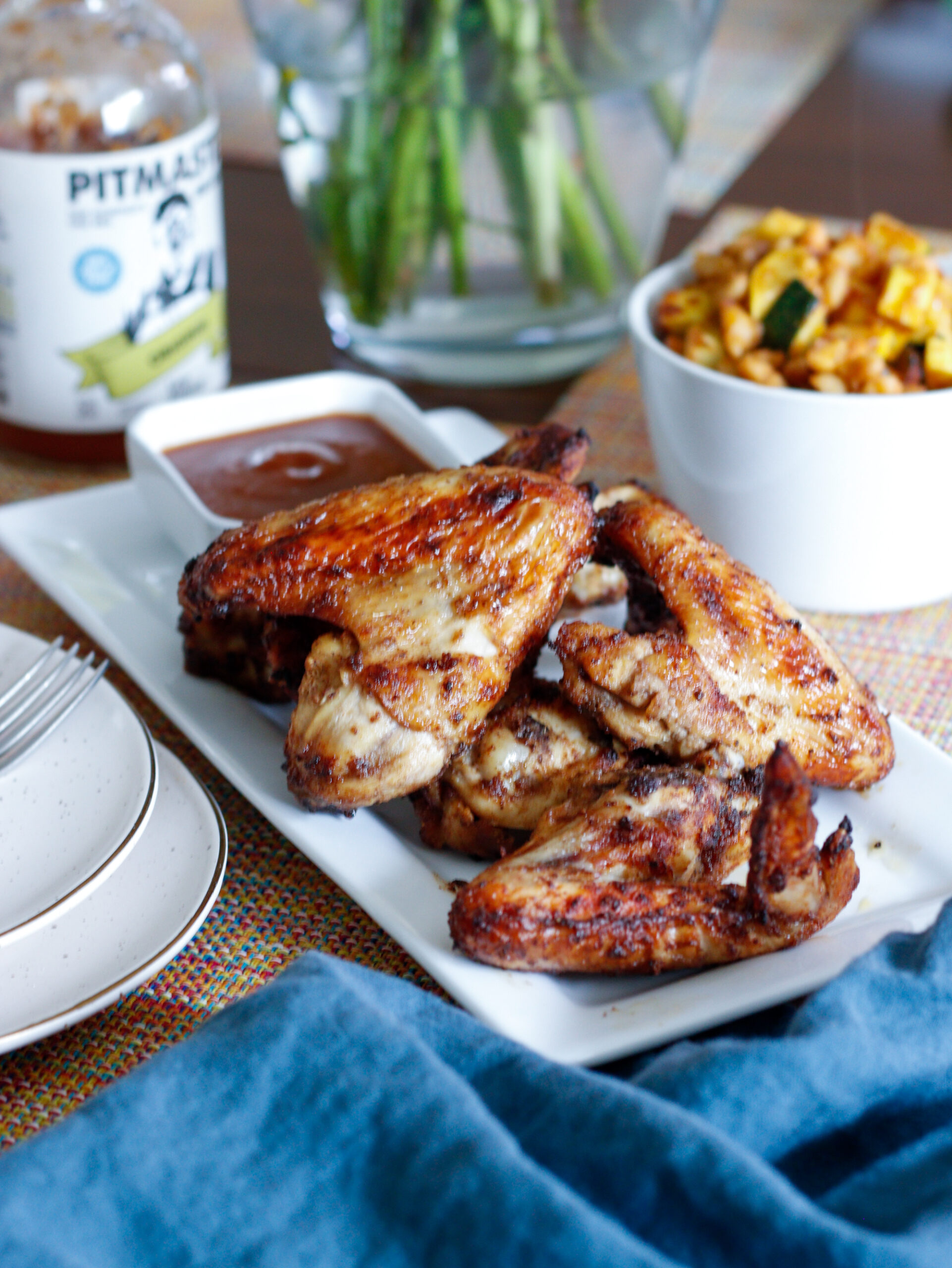 Close up of crispy chicken wings on a plate