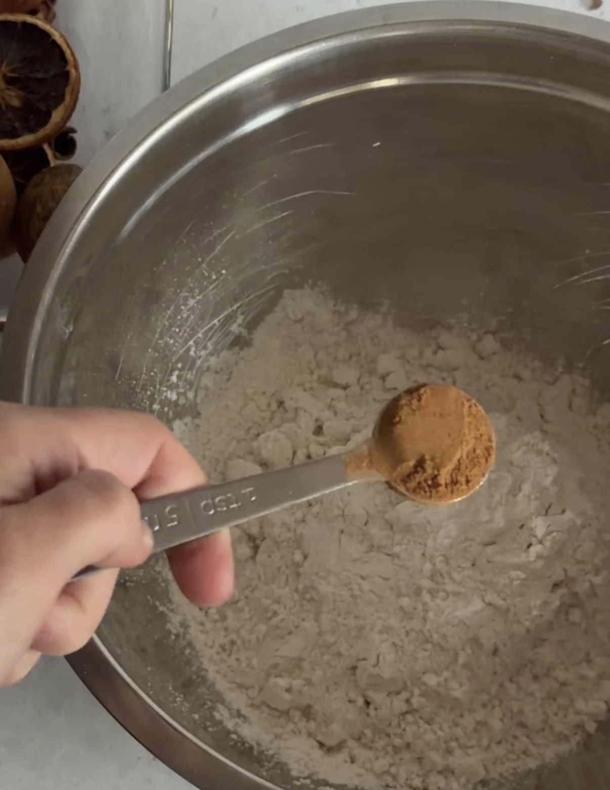 mixing dry ingredients for pumpkin spice chocolate chip cookies