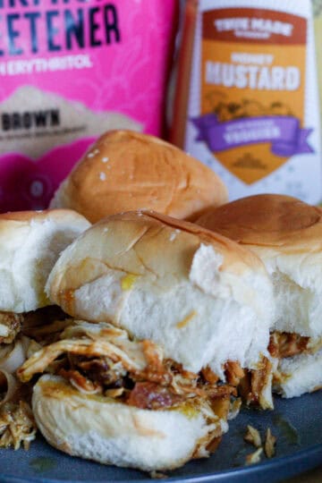 slow cooker honey mustard chicken sliders on a plate