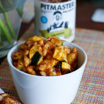 BBQ white beans and squash in a white serving dish